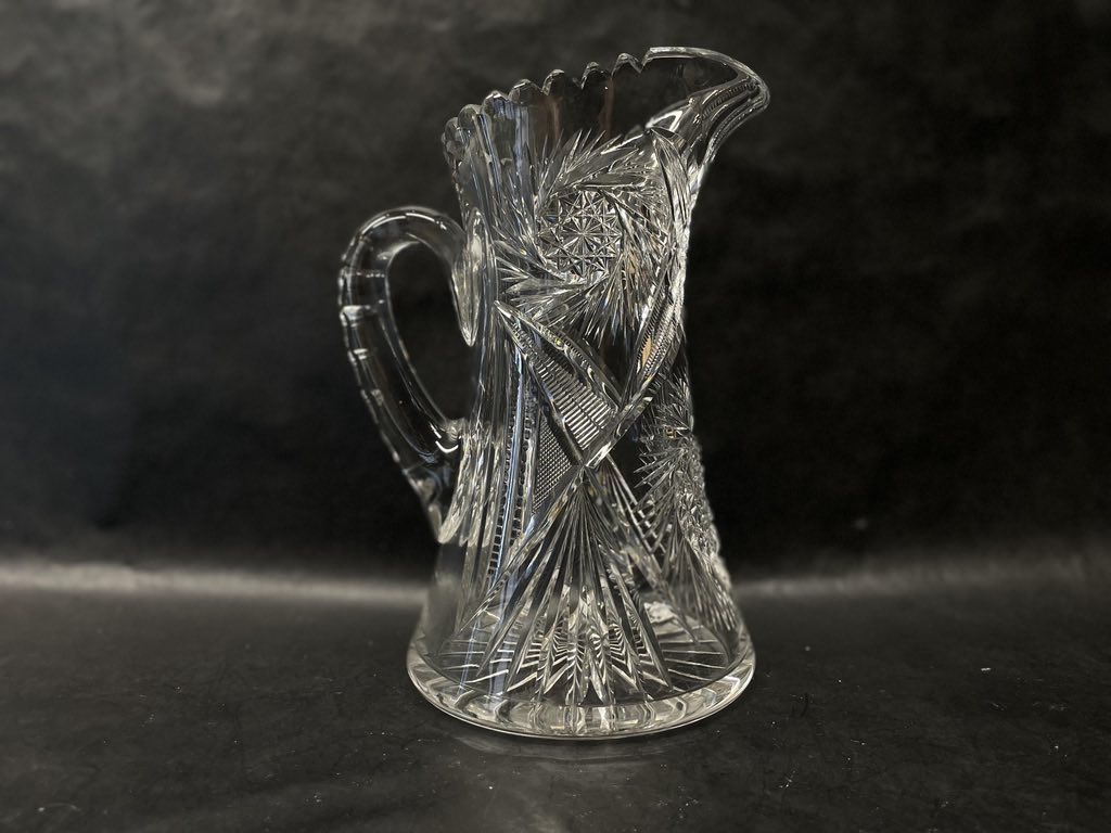 Original photo showing crystal pitcher before cleanup